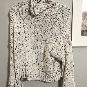 white sweater with colorful dots